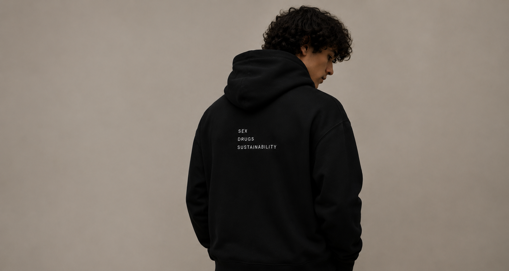 Person wearing the SDS black hoodie — Made with restraint